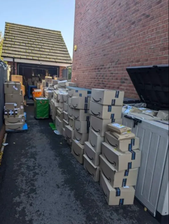 Overflow stock stacked outside the garage